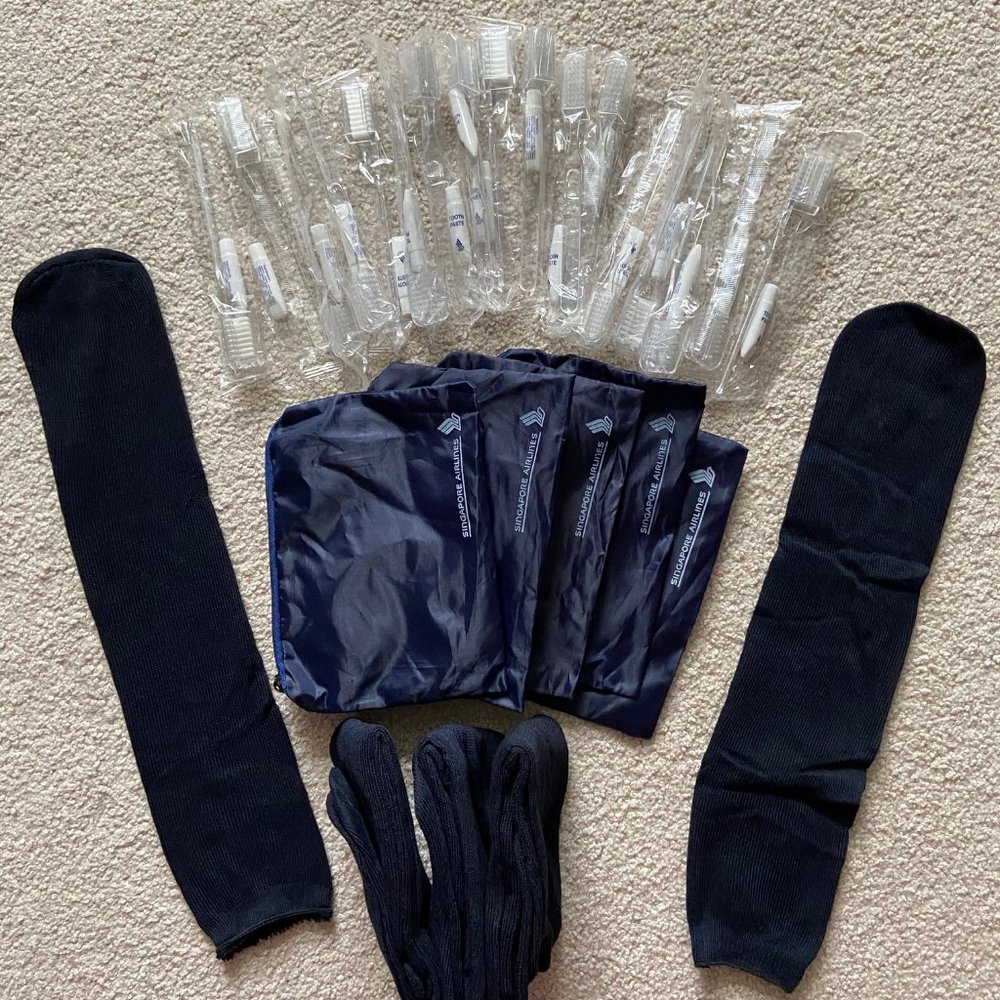 - 17 tooth brush with paste 5 long black cotton socks 5 Singapore zip up amenity